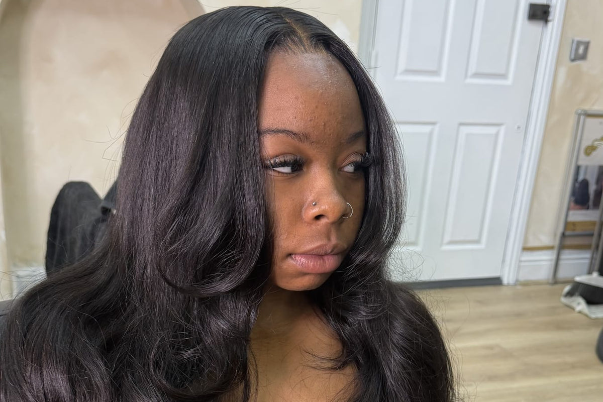 A client with a finished wavy install at MidasTouch Studios